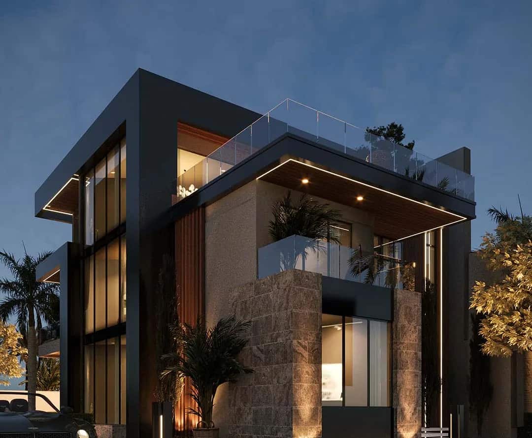 VAAL Ghana luxury residence at dusk, warm light in every window