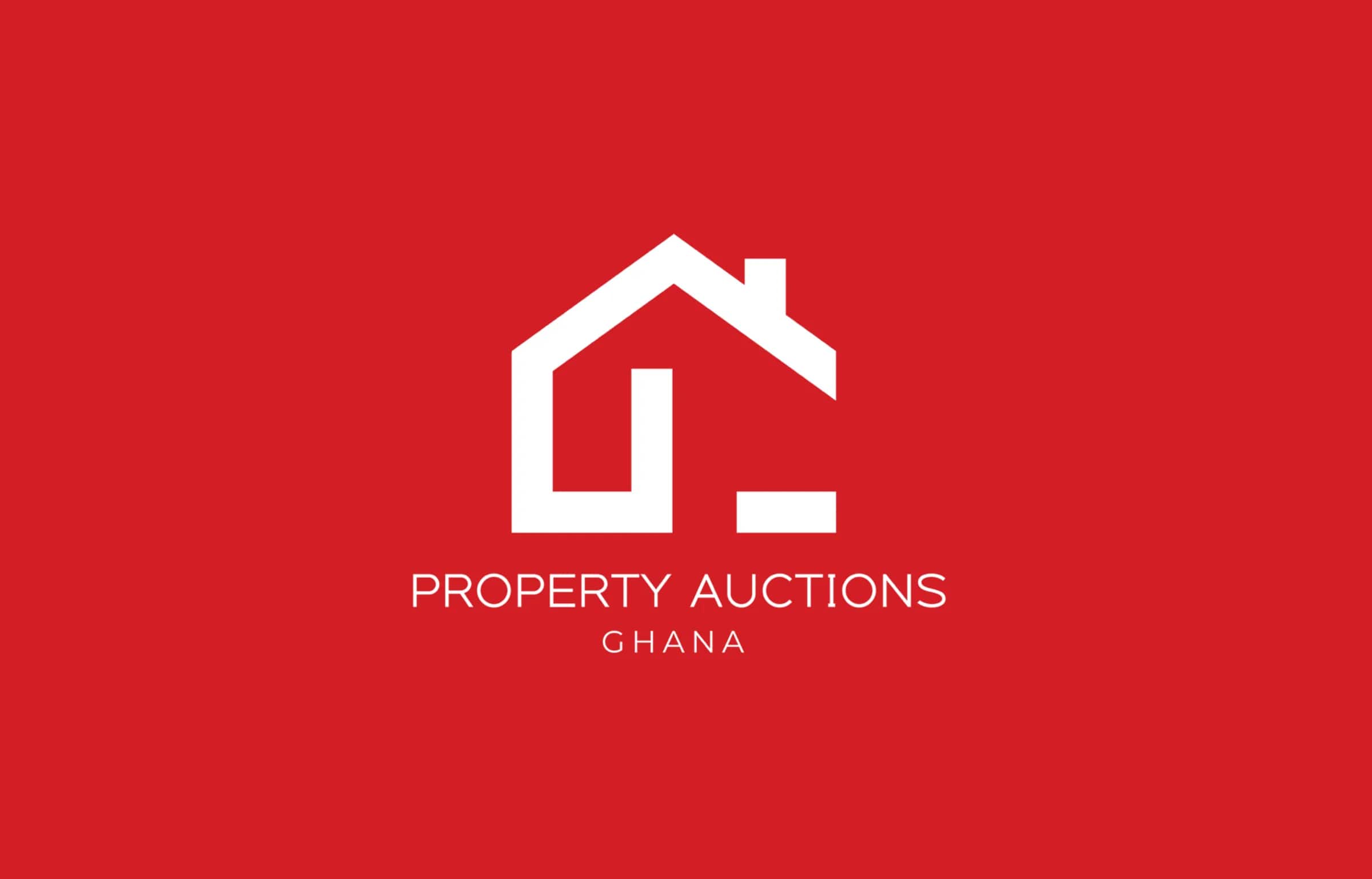 The Property Auctions Ghana mark reversed out of a full red field