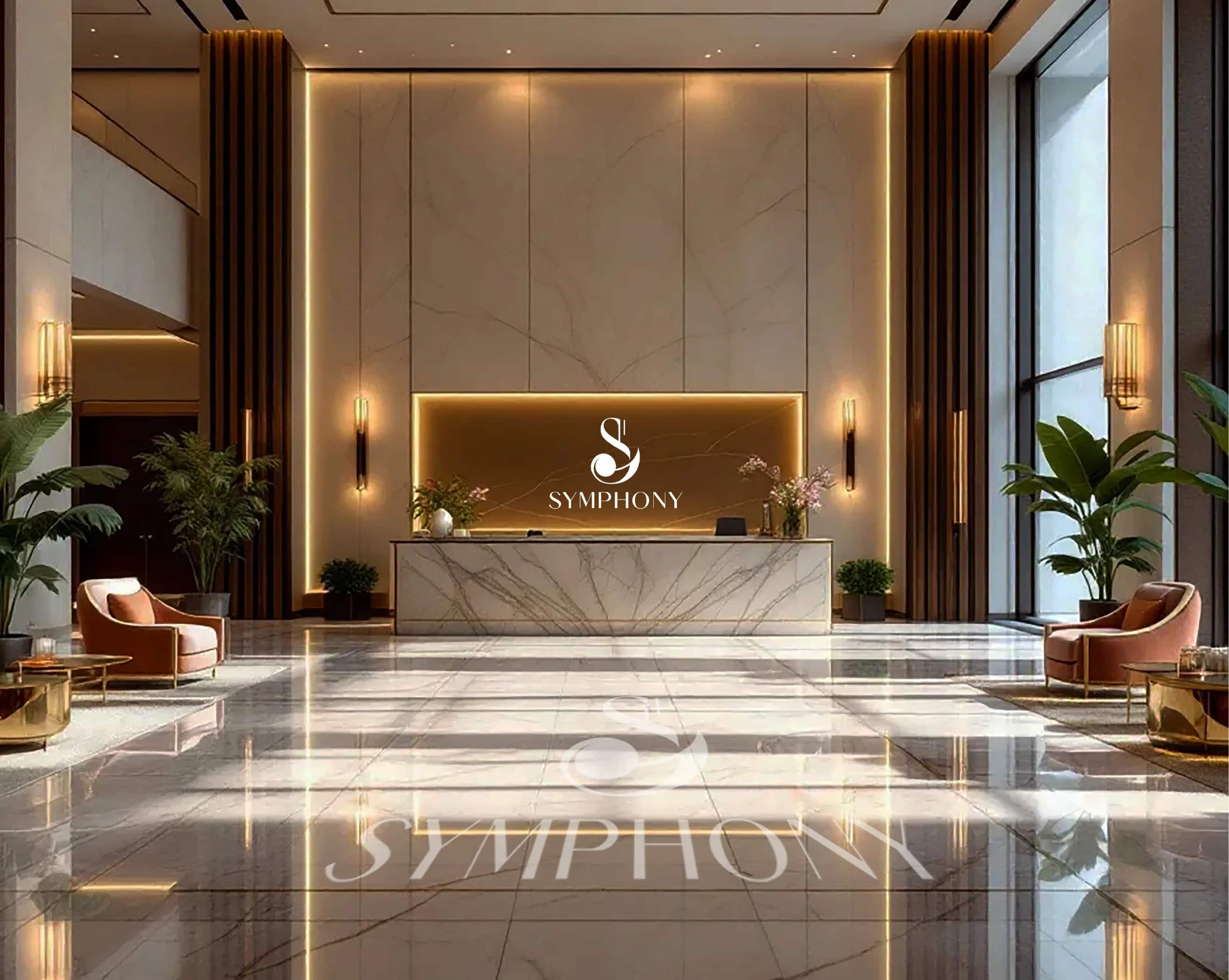 The Symphony brandmark lit above a marble reception desk in a real interior render