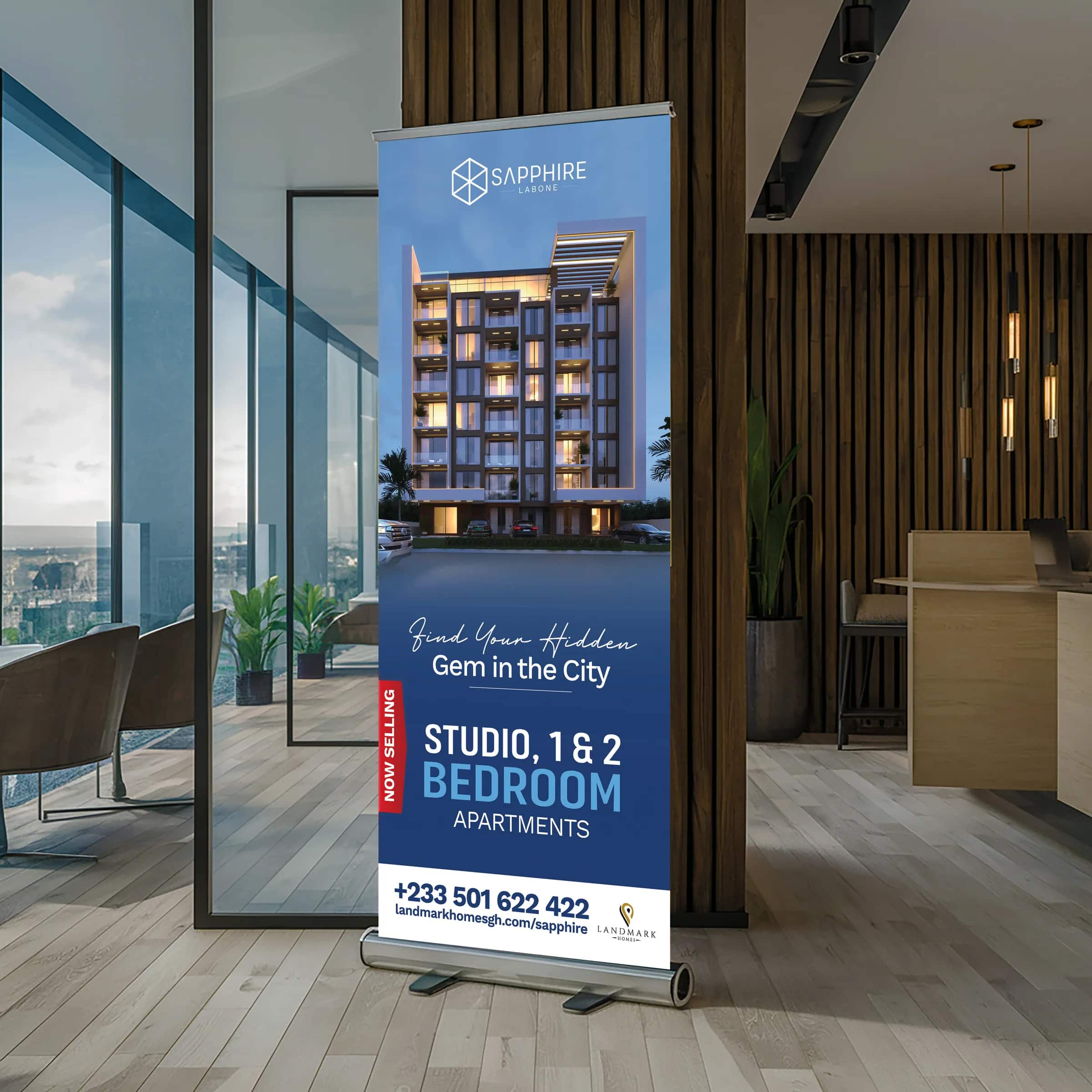 Sapphire Labone pull-up banner standing in a sunlit office interior